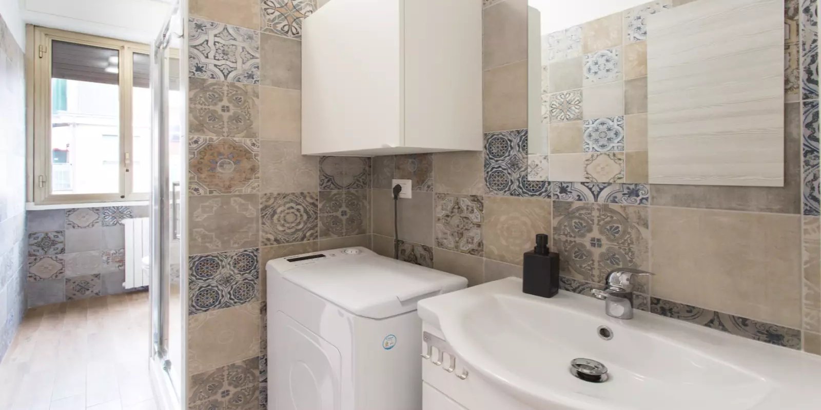 Laundry area — Rubino, Bocconi · Ripamonti, Milan